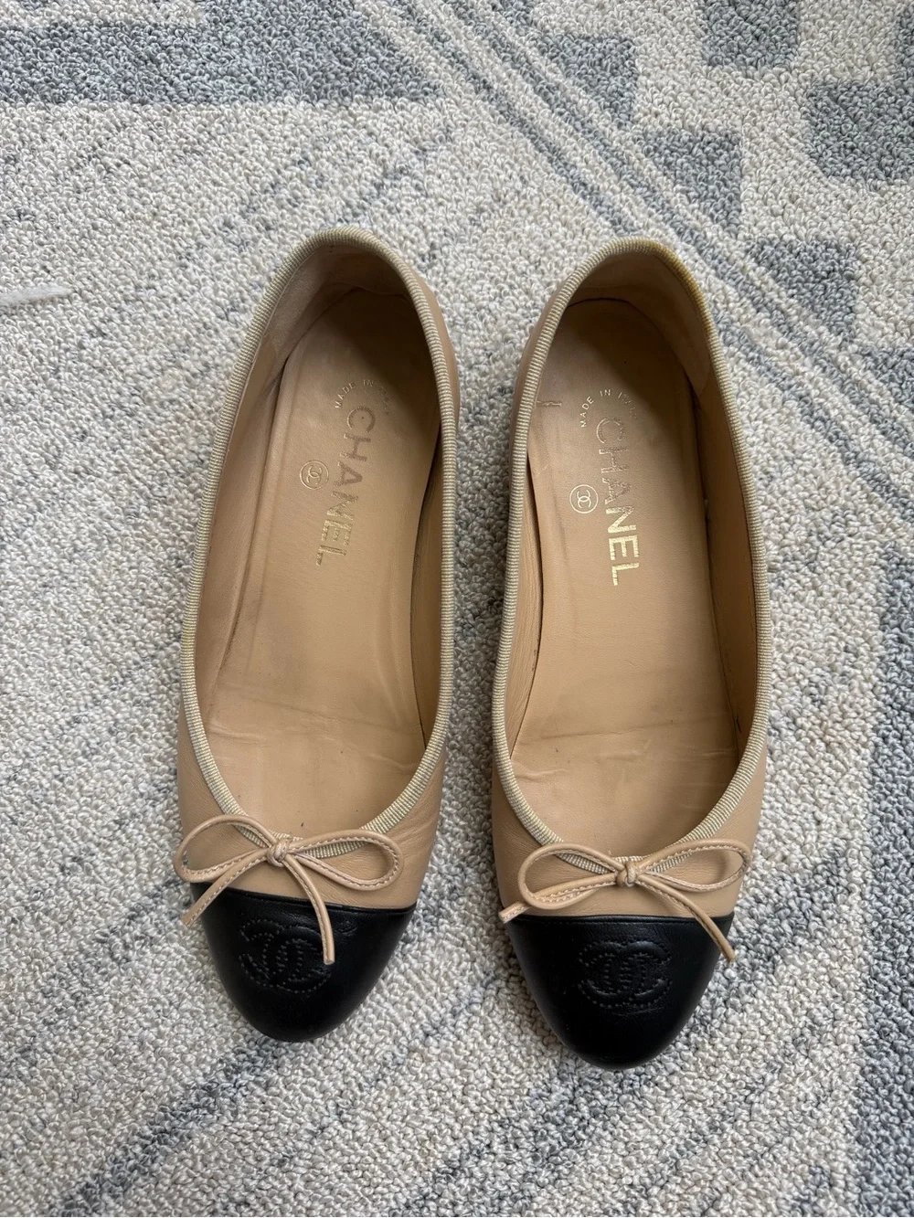 CHANEL Beige and Black Leather Cap-Toe Ballet Flats